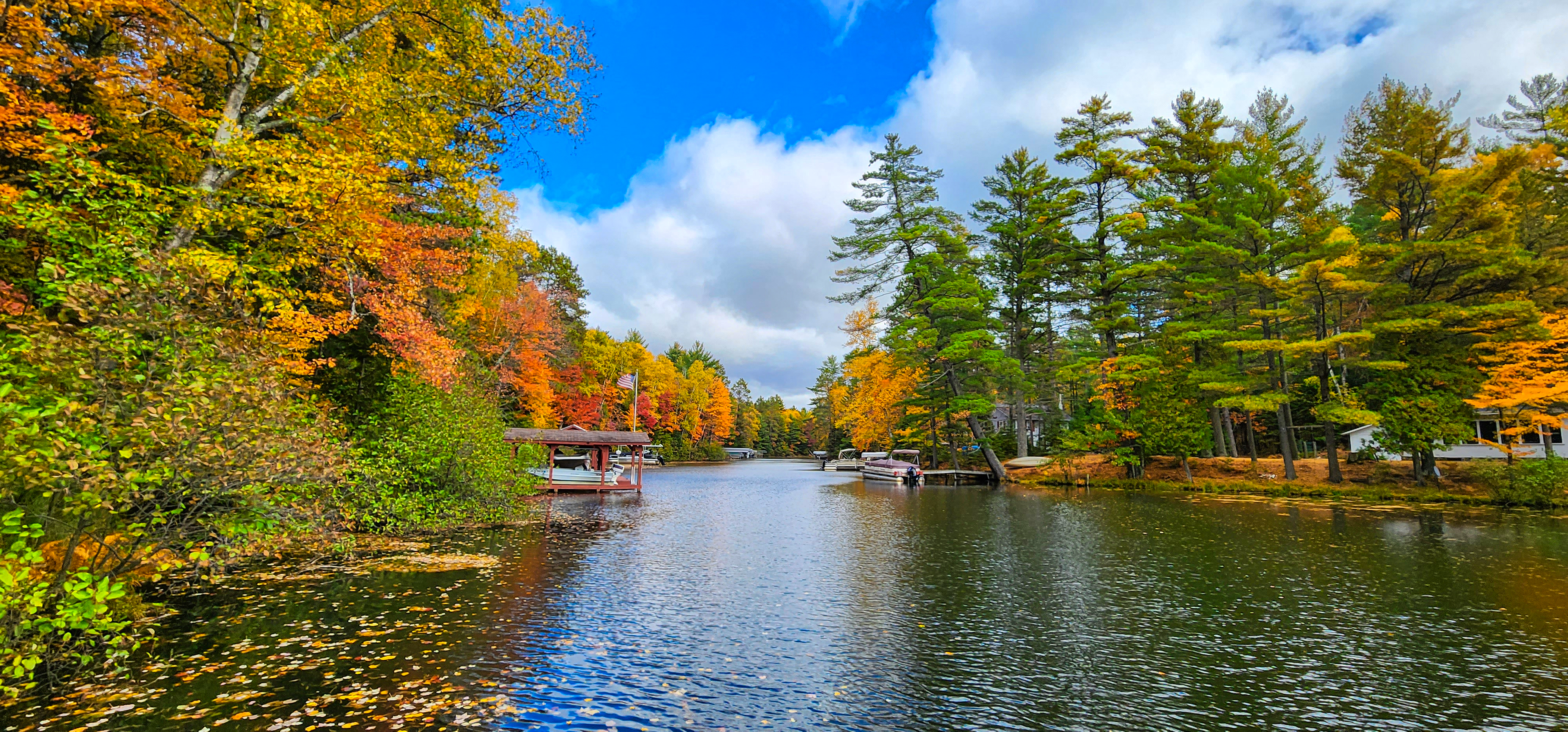 The Cub House waterfront surrounded by vivid autumn color