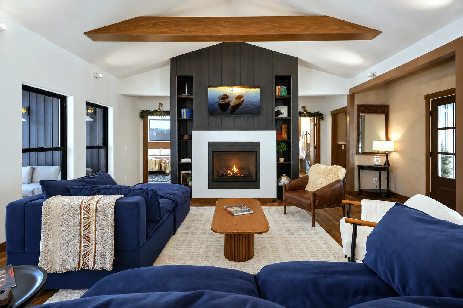 The great room centered on the gas fireplace